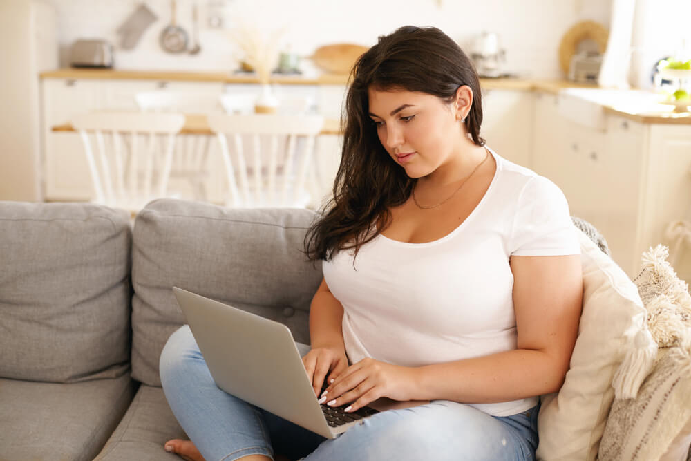 Adorable,Plus,Size,Student,Girl,With,Loose,Black,Hair,Keyboarding